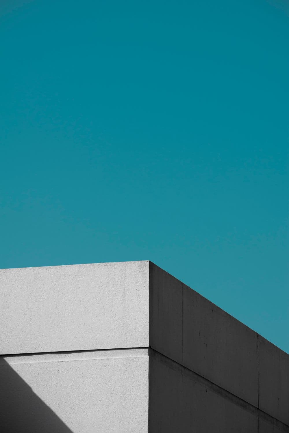 Crisp concrete rooflines against an open sky
