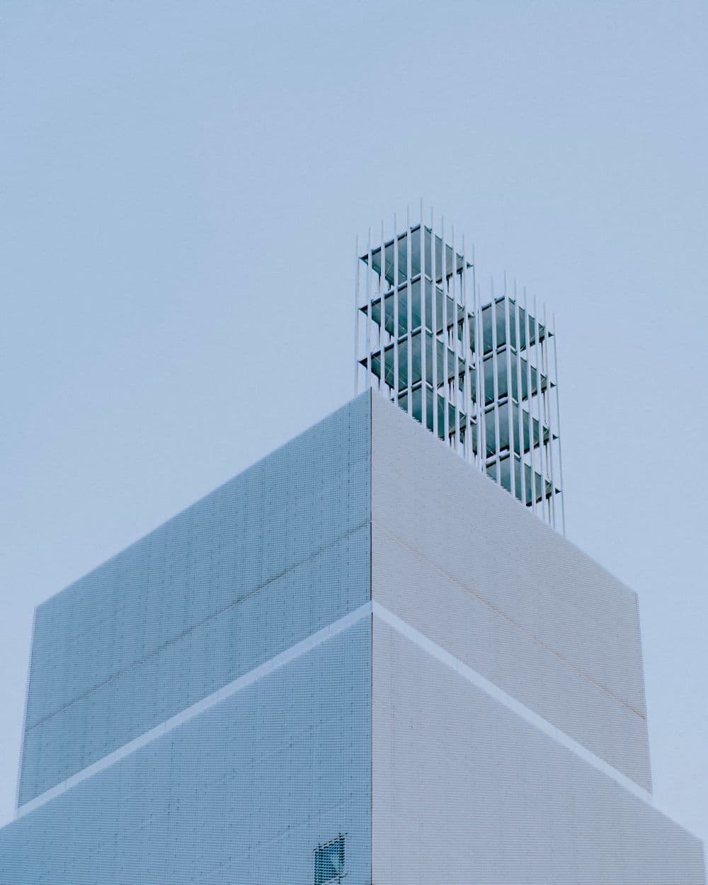 Upward view of converging high-rise facades
